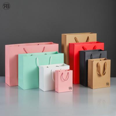 China Wholesale Recyclable Luxury Gift Shopping Art Paper Bags Custom Logo Printed Gift Shopping Clothes Packaging Paper Bag With Handles for sale