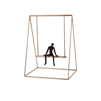 China Modern Gold Figurine Sculpture Statue Man Swing Table Home Decor for sale