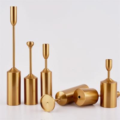 China Modern Nordic Unique Luxury Fancy Iron Long Rod Bedroom Gold Metal Candle Holder for sale