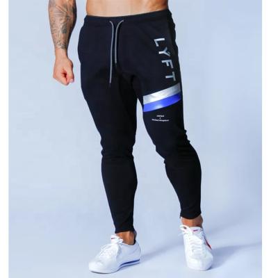 China Anti-Wrinkle Skinny Jogger Pants Mens Running Sweatpants Cotton Track Pants Gym Fitness Sports Pants Bodybuilding Training Pocket Male Panties for sale