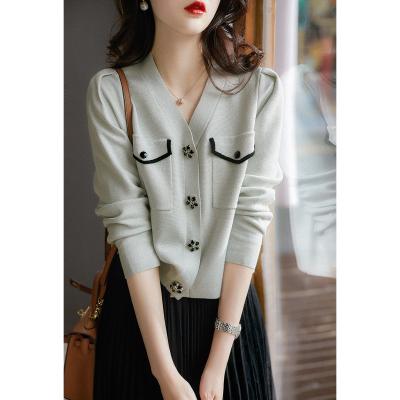 China Anti-wrinkle petal buckle decoration wool sipping idling fragrance small knitted cardigan with bright silk temperament long sleeve coat slims for sale