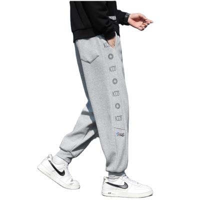 China QUICK DRY sweatpants boys' gaiters loose pants 2021 new autumn and winter guard pants for sale