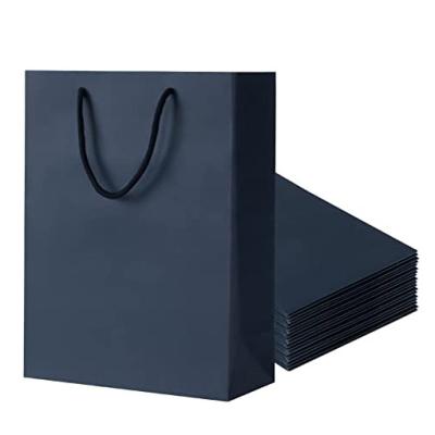 China Luxury High Quality Black Recycled Materials Kraft Paper Bags With Handle Offset Printing Logo Custom Paper Bags For Gift And Shopping for sale