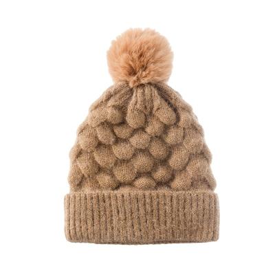 China JOINT Women's Winter Thick Solid Fleece Striped Soft Knit Beanie Hat With Faux Fur Pom Pom for sale