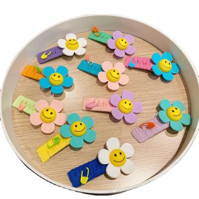 China JIRIS Style Factory Sale Fashion Children's Headdress Solid Color Sun Flower Smile European and American Woolen Hair Clips Cute Crochet Hairpins For Girls Women for sale