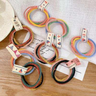 China Korean New Soft Nylon Hair Tie Towel Stretch Top Candy Colored Head Rope Bright Colorful Circular Head Rope for sale