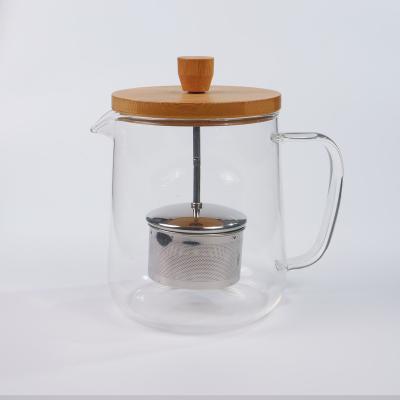 China Hot Selling Modern Transparent Home Drinkware Stored Glass Water Jars With Strainer for sale