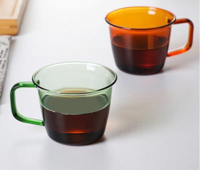 China Wholesale 230ml Viable Hot Selling Coffee Mug Borosilicate Colored Water Colored Water Glass Cup With Handle for sale