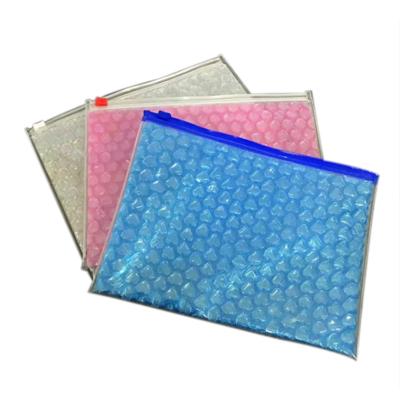 China Zip Lock+tear notch popular wholesale custom reusable pink bubble pvc printing logo ziplock protective packaging bag heart for sale