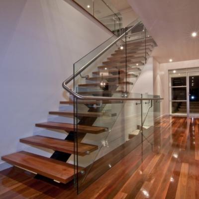 China Modern interior steel beam walnut oak stair treads stairs with glass balustrade glass fence villa for sale