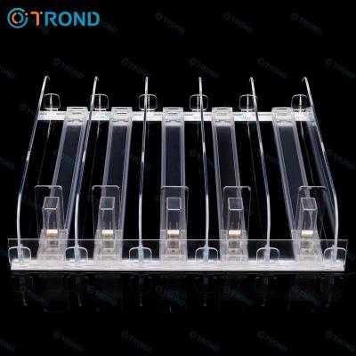 China Cigarette Supermarket Automatic Feeding Display Tray Spring Loaded Shelf Pusher System For Beverage for sale