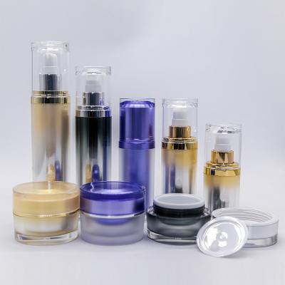 China 2022 New Design Luxury Gold Cosmetic Packaging 15ml 30ml 50ml Black Airless Pump Bottle for sale