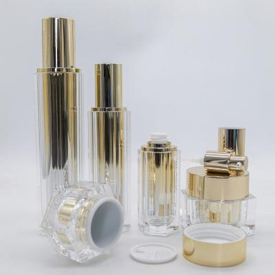 China 30ml 50ml 100ml Cosmetic luxury acrylic gold plastic square lotion bottles jar for cosmetic packaging for sale