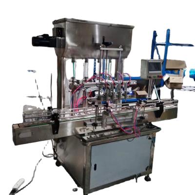 China SY-APF4 Automatic Food 4 Nozzles Paste Liquid Filling Machine For Assemble Production Line for sale