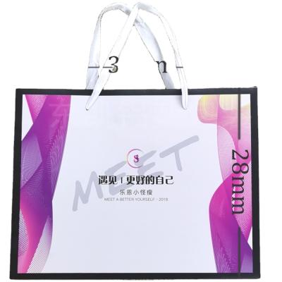 China Recyclable Wholesale Custom Printed Luxury Shopping For Clothing Packaging With Handle Paper Bags for sale