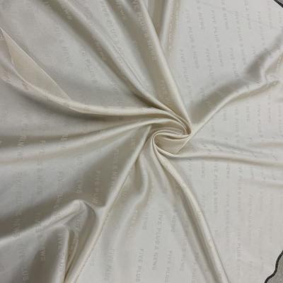 China Letters Pattern Creamy Fancy Design Cheap Price Spandex Fashion Fabric For Evening Dresses for sale