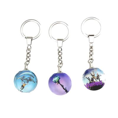 China Shooting Games Fort Crystal White Led Decorative Key Chian Bag Key Chain for sale