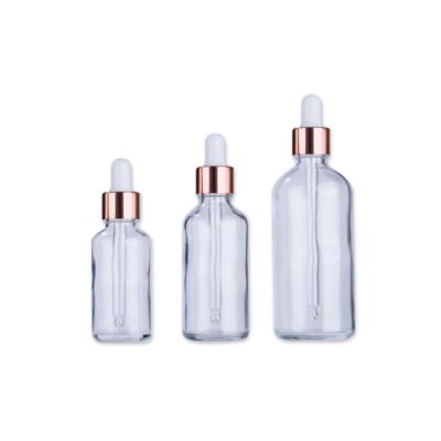 China Eco-friendly Recyclable Luxury Rose Gold Round Dropper Glass Bottle For Natural Skin Care Oil Container for sale