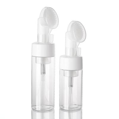 China Washable Cosmetic Facial Detergent 100ml 150ml 200ml Clear Pet White Foam Pump Bottle With Eva Silicone Brush for sale