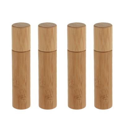 China Eco-friendly Recyclable Fragrance 10ml 15ml Clear Hot Selling Transparent Essential Oil Roll On Roller Glass Bottle With Lid And Bamboo Rollers for sale