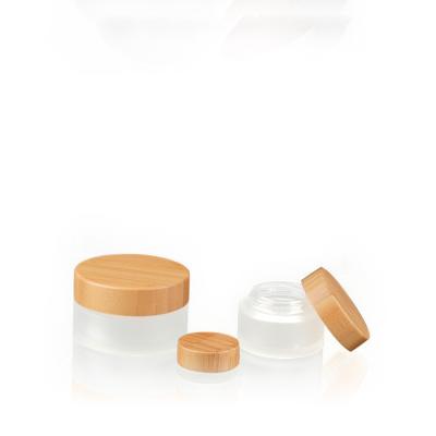 China 5g Cosmetic Bamboo Cosmetic Jar Cap Glass Wooden Jar Round Glass Cream Jar for sale