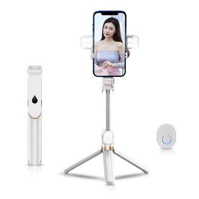 China XT06S Portable Flexible Foldable Long Mobile Phone Wireless Selfie Stick Tripod For Phone for sale