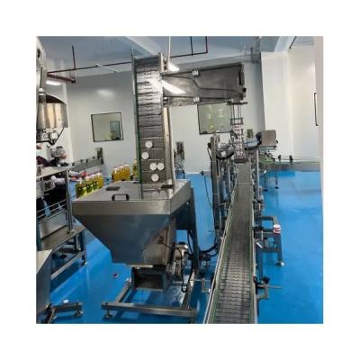 China Lifting Type Food Sorting Capping Machine For Machine Production Filling And Capping Line for sale