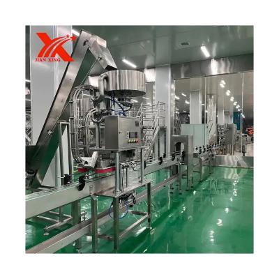 China Automatic Food Press Lid Machine Water Bottle Capping Machine Automatic Capping Machine for sale