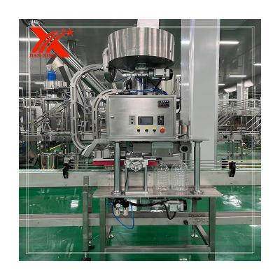 China Automatic Filling and Capping Press Lid Machine Water Bottle Machine Food Bottle Water Capper for sale