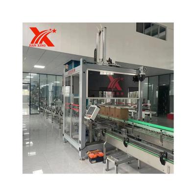 China Automatic Food Glass Bottle Carton Box Packing Machine Carton Liquid Packing Machine for sale