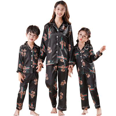 China New designer QUICK DRY Family Pajamas Silk set mommy and me suitable cute cartoon warm pajamas for sale