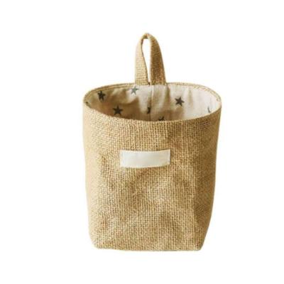 China Custom Copy Viable Logo Basket Jute Dot and Striped Foldable Storage Bag Cotton Fabric Jute Hanging Canvas Basket for sale