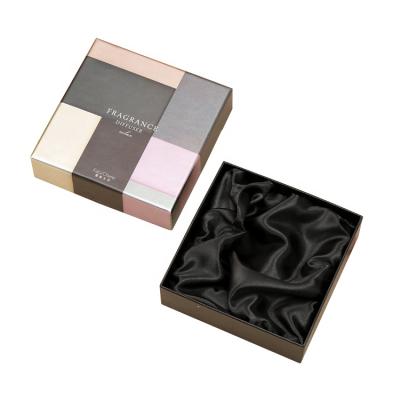 China Recyclable Luxury Cardboard Box With Foam Silk Insert Wholesale Packaging For Cosmetic Set for sale