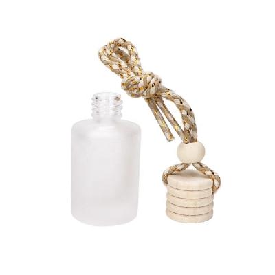 China Car Decoration Perfume Bottle 12ML Cylinder Hanging Glass Ftosted Perfume Hanging Cover Matte White Bottle Available Container Car Bottles Screws for sale