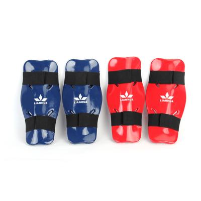 China Own Factory Dipped NBR Foam Taekwondo Leg Pad Karate Shin Guard Sports Leg Pad Training Equipment for sale