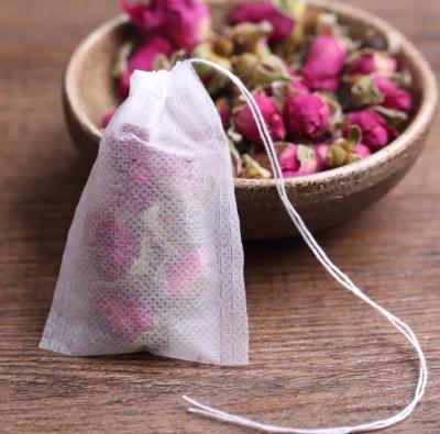 China Disposable Empty Tea Bags Loose Herb Tea Bag Drawstring Fabric Nonwoven Tea Bags for sale