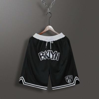 China OEM Breathable Full Sublimation Mesh Polyester Basketball Shorts With Pockets for sale