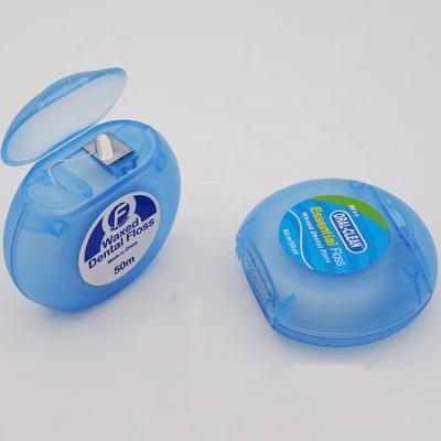 China Care Nylon Oral Dental Floss In Round Shape Container With Blister Card for sale