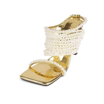 China Breathable Gold Shoes Heels For Wedding Women Luxury Designer Stiletto Sandals High Heel Gold Buckle Pearl High Heels For Wedding for sale