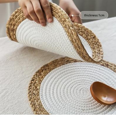 China 2021 Sustainable Amazon Top Selling Home Decoration Eco-Friendly Woven Rattan Place Mat Round Braided Straw Placemats Customized Table Mat for sale