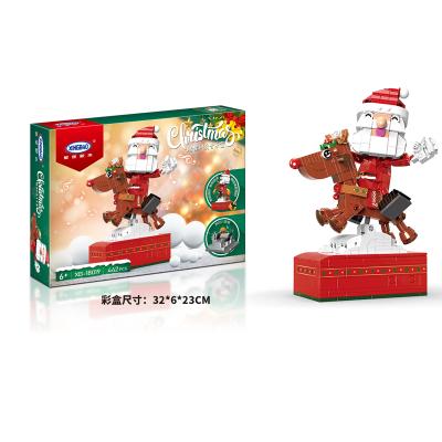 China XINGBAO 18019 Electronic Christmas Toy Santa Claus Music Box Gingerbread House Model Building Blocks Gift Toys For Children Christmas New Year 10267 for sale