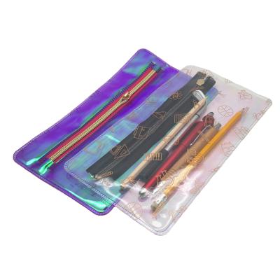 China Colorful Flat Geometric Laser Bag PVC Laser Stationery Back To School Pencil Bag for sale