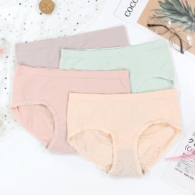 China Gift Boxed Solid Color Antibacterial Seamless Rise Mid Briefs Women Underwear 4 Pcs Breathable Panties For Girls for sale