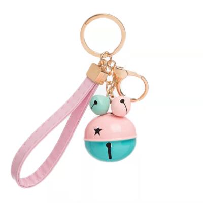 China Creative Bag Pendant Cartoon Cut Custom Metal Pendant Gift Two Color Bell Key Chain Bag PU Rope Key Ring Car Key Chain for sale