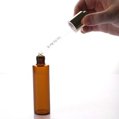 China Manufacturer Huagui Wholesale Mini Brown And Transparent Clear Essential Oil Dropper Glass Bottle With Aluminum cap for sale