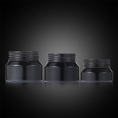 China Embalaje de lujo para el cuidado de la piel, frascos de crema de vidrio de 15G, 30G, 50G, botellas con hombros inclinados transparentes negros para crema para los ojos y la cara en venta