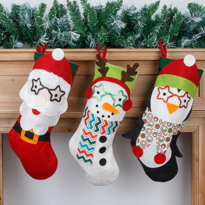 China 2021 Eco-friendly Hot Sale Christmas Decoration Supplies Colorful Red And White Cartoon Santa Snowman Christmas Stocking for sale