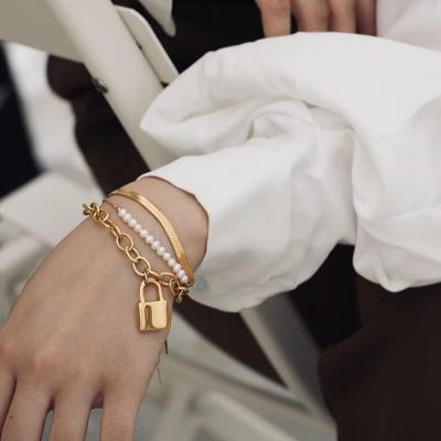 China Sailing/trendy/cute style gold plated stainless steel jewelry, personalized chain bracelet, creative lock bracelet for sale