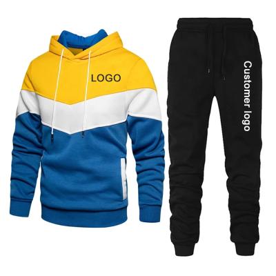 China Activewear Breathable Wholesale Patchwork Hooded Gym Sweatshirt Set Fleece Men Casual Tracksuit Logo Sports Jogger Set Custom Made With Pocket for sale