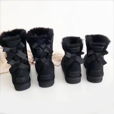 China Anti-Smell Best-Selling Colors Winter Fur Snow Bow Boots For Women for sale